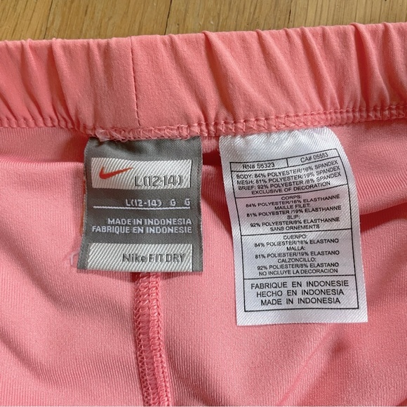 Nike Dry Fit Coral Pink Tennis Skirt w/ Red & White Mesh Stripe, Yellow Logo L - Picture 4 of 5